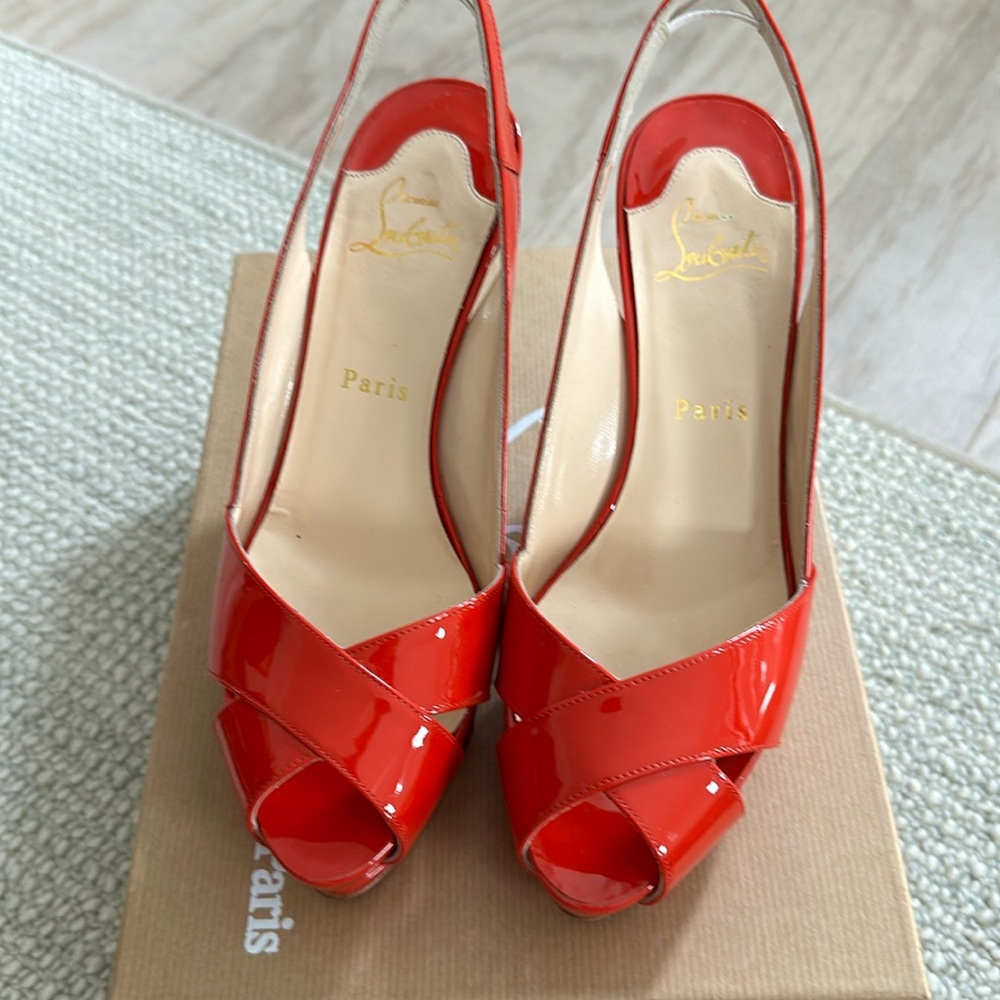 Gently worn, crisscross, red sling back heels